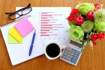 graph paper and note book in business concept