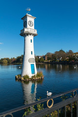 Scott Monument in the autumn sunshine at Roath Park Lake Cardiff South Wales UK