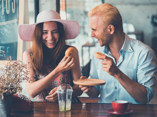 couple drinking coffee in cafe