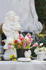 Monument of ancient angel on cemetery.