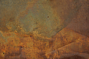 Еexture of rusty iron, cracked paint on an old metallic surface, sheet of rusty metal with cracked and flaky paint, abstract rusty metal texture. Horizontal