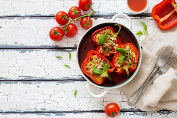 Bell peppers filling with vegetables, bulgur and cheese