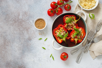 Bell peppers filling with vegetables, bulgur and cheese