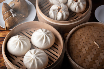 chinese steamed bun in traditional bamboo steamer