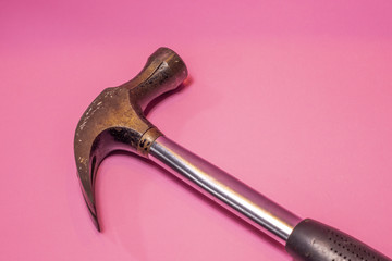 An Isolated Hammer on Pink