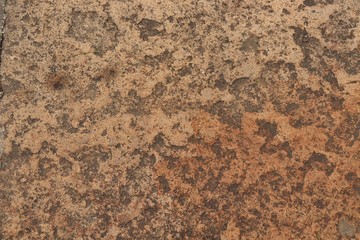 rough uneven surface of light and dark brown