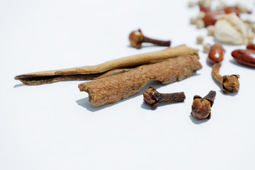 cinnamon sticks and clove with seasoning background