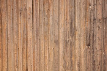 narrow brown wooden vertical slats