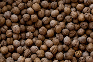 background brown natural walnuts closeup