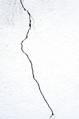 Crack on a white wall