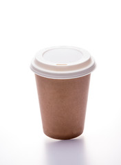 Disposable coffee container in isolated background.