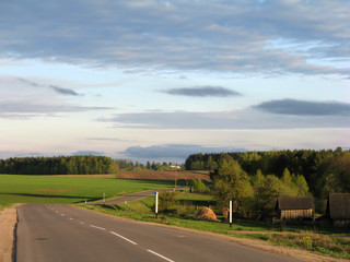 View of twisting asfalt road in rural area of Karelia, Russia