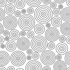 Seamless abstract pattern with black circles on white background