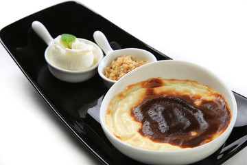 a rice and milk pudding white background turkish traditional dessert