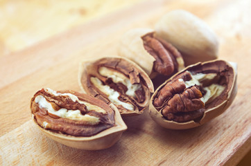 pecan close-up macro high resolution on wooden background