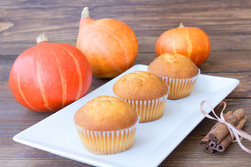 Sweet homemade pumpkin muffins with cinnamon. Autumn healthy dessert. 