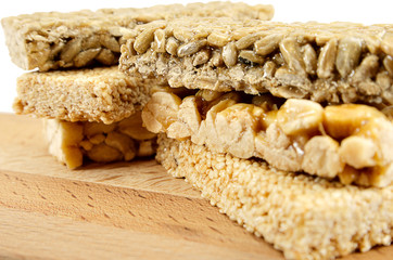 sugar glazed kozinak, sunflower seeds and peanuts in sugar glaze, Oriental sweets close-up macro, brittles