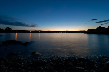 Scenic night view of the Croatian coastline, seen from a beach near Soline on Krk island, Croatia, during blue hour