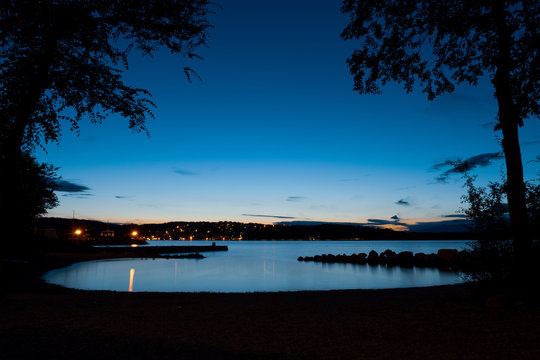 Scenic night view of the Croatian coastline, seen from a beach near Soline on Krk island, Croatia, during blue hour