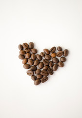 Coffee beans isolated on the white background, heart shape. I love coffee. Arabica and robusta.