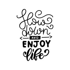 Slow down and enjoy life - hand drawn lettering phrase isolated on white background. Fun brush ink inscription for photo overlays, greeting card or print, poster design.