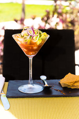 Shrimp and avocado appetizer with place setting