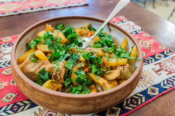 Meal in Armenia - Ojakhuri. Meat (usually pork) and fried potatoes with added vegetables.