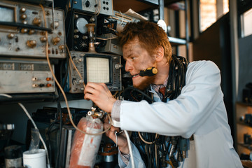 Crazy scientist conducting an experiment in lab