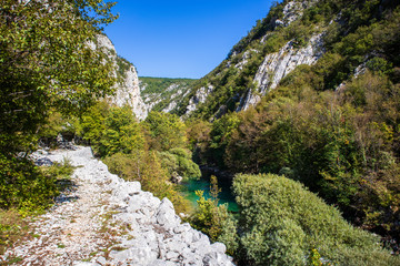 Footpath next to the rocks and mountains and Una river in village Martin Brod in Bosnia and Herzegovina