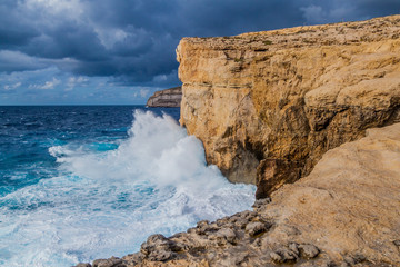 Obraz premium Cliffs of Dwejra, location of the collapsed Azure Window on the island of Gozo, Malta