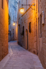 Narrow street in the fortified city Mdina in the Northern Region of Malta