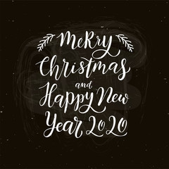 Merry Christmas and Happy New Year 2020 - handwritten lettering calligraphy for postcard, invitation, print, poster, banner, web on black chalkboard.