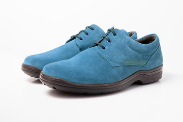 pair of blue shoes isolated on white background