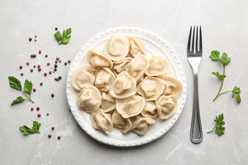 Flat lay composition with tasty dumplings on marble table