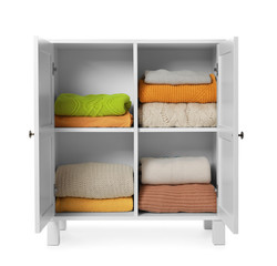Wooden cabinet with clothes on white background. Stylish furniture for wardrobe room