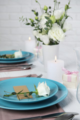 Obraz na płótnie Canvas Elegant festive table setting with blank card in restaurant
