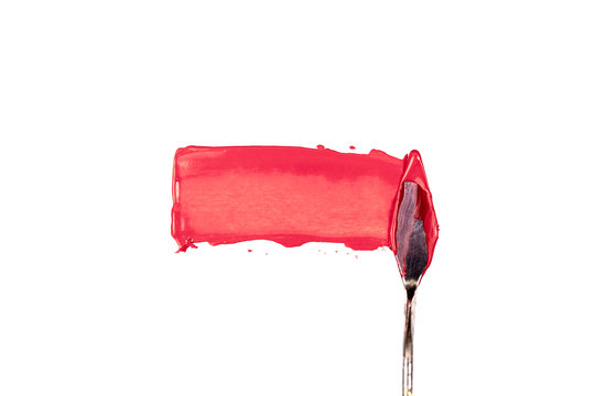a painting palette knife isolated on a white background painting a red with copy space