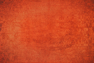 Abstract background on orange color rough surface