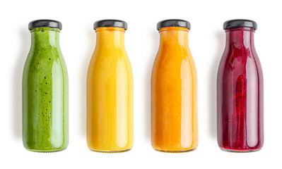 Green, yellow, orange and red smoothie in glass bottles - 295558521