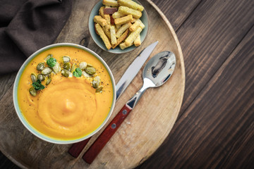 Pumpkin soup with seeds and  croutons