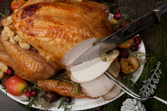 Carving Roasted Christmas Turkey with Grab Apples