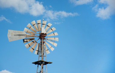 Sky and mill in a field in Argentina