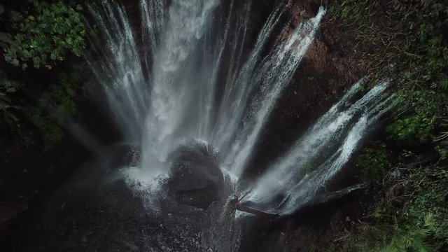 Fantastic Natural Tiu Kelep Cascade Waterfall on Lombok Island Indonesia, Top Down Birdeye Ascending Aerial