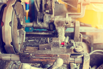 Pipe making by the threading machine. The lathe machine or turning machine cutting the thread at the end of metal pipe or tube. Classic manufacturing process.