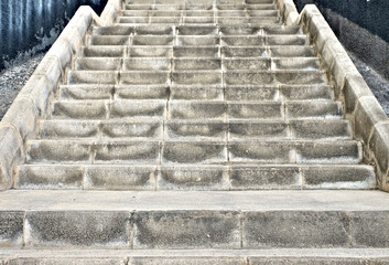 Empty concrete stairs or steps leading upwards.