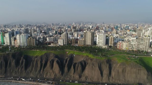 CRANE UP Aerial view of Miraflores district in Lima, Peru