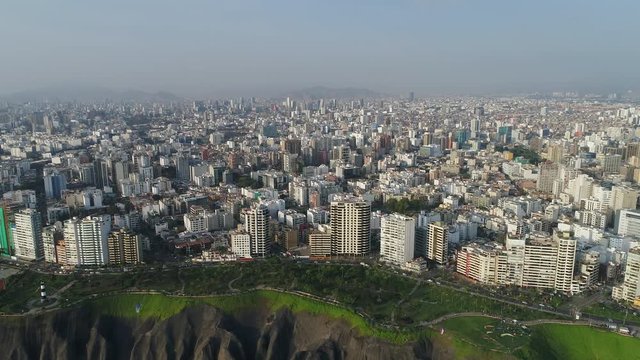 CRANE UP Aerial view of Miraflores district in Lima, Peru
