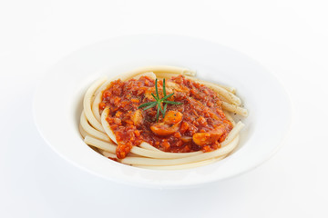Studio macro Spaghetti bolognese on a white plate