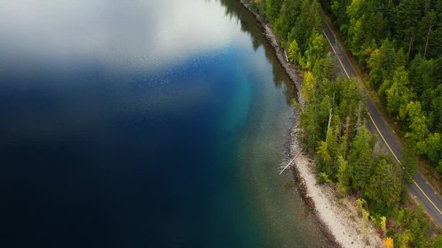 Lake McDonald in Glacier National Park, travel around the United States, beautiful Montana, snowy mountains' tops, breathtaking landscape