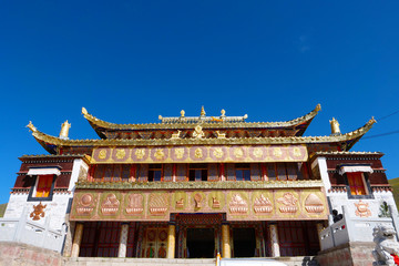 Fototapeta premium Golden Summit Tibetan Buddhist monastery Arou Da Temple in Qinghai China.